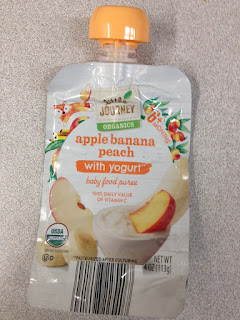 An empty pouch of Little Journey Organics Apple Banan Peach with Yogurt Baby Food Pouch, from Aldi