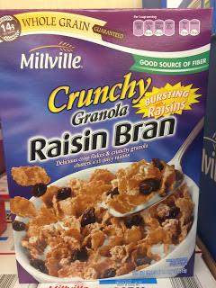 A box of Millville Crunchy Granola Raisin Bran Cereal, from Aldi